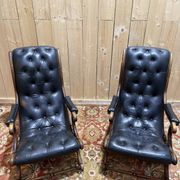 Paire de fauteuils anglais chesteefield en cuir noir
