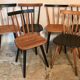 Set of 6 mismatched vintage chairs with bars and compass legs