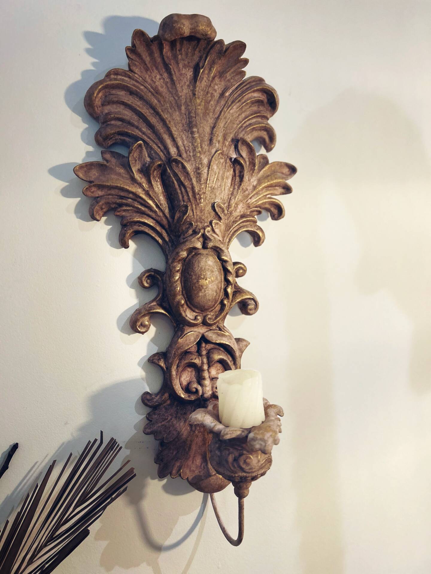 Incredible patinated wall candle holder