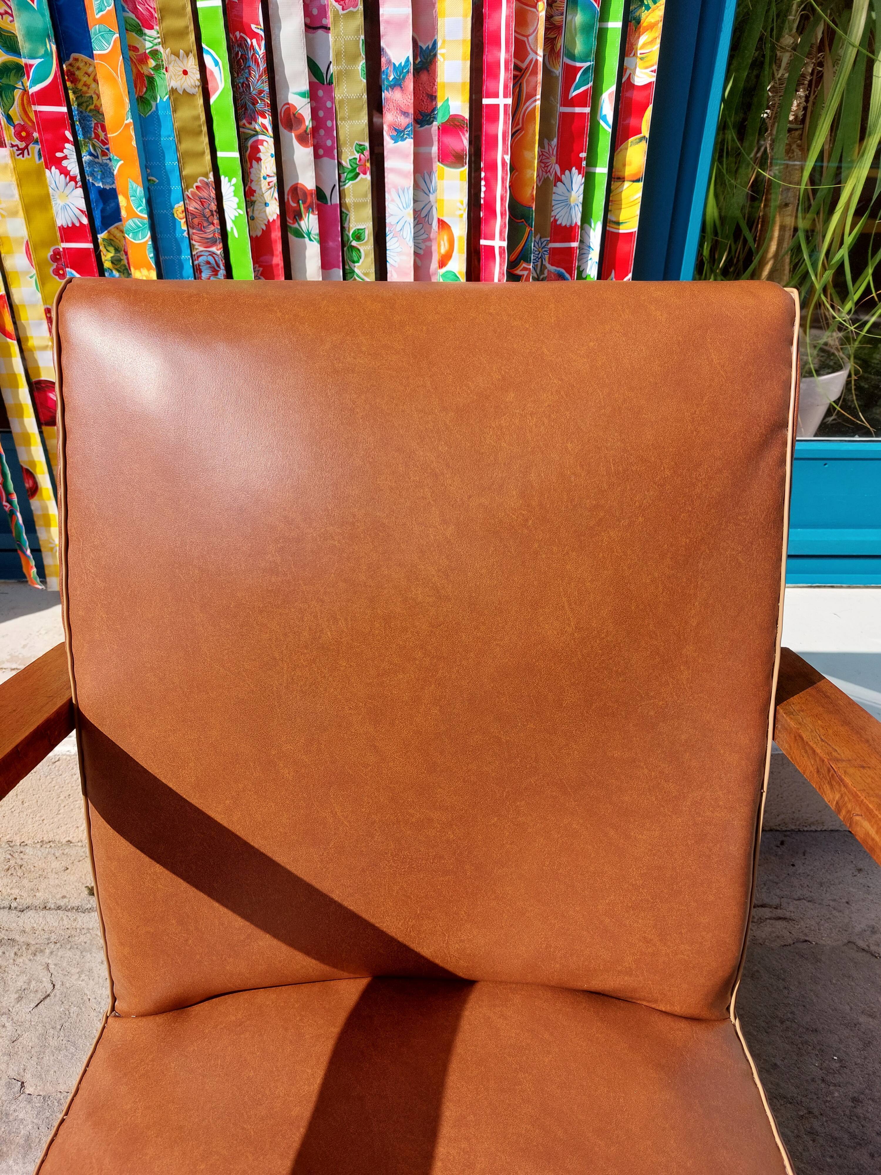 Low armchair, brown imitation leather