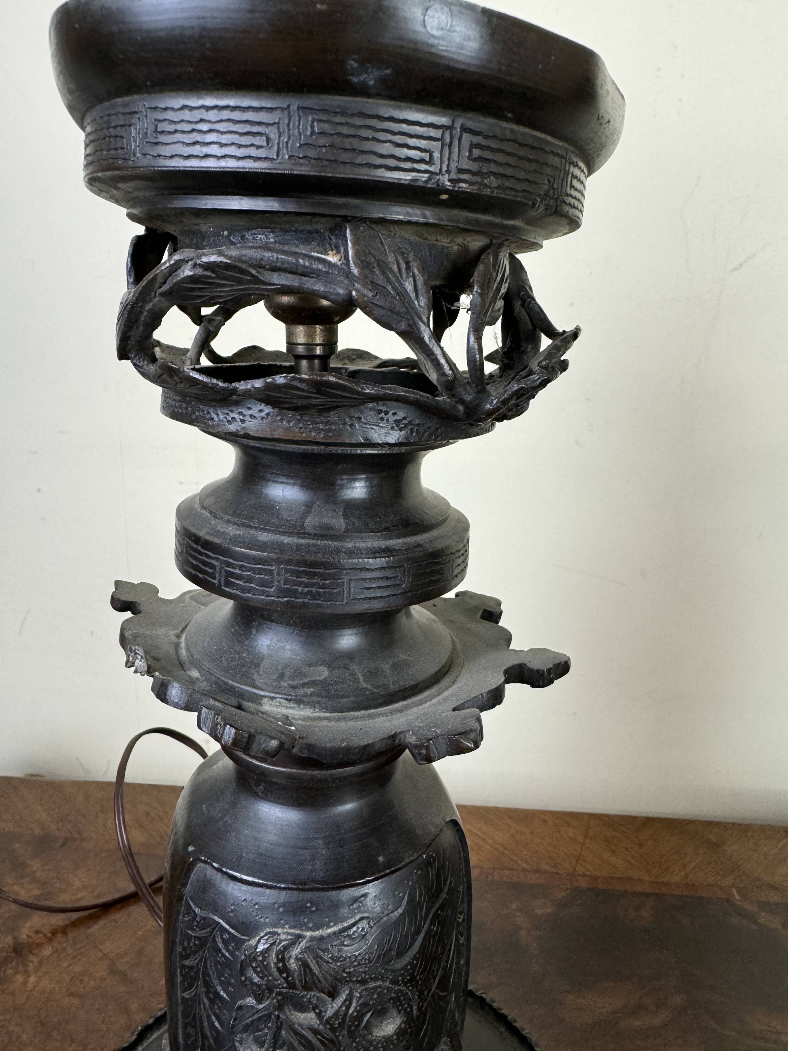 Japan Meiji period: Pair of patinated bronze candlesticks circa 1880