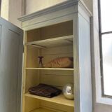 Blue patinated cap cabinet