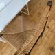 Wooden chair and brutalist straw