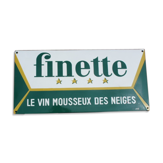 Plaque émaillée vintage sur le vin mousseux du Jura Finette
