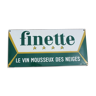 Plaque émaillée vintage sur le vin mousseux du Jura Finette