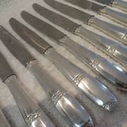 12 silver plated table knives by Argit goldsmith? Art Deco floral bands