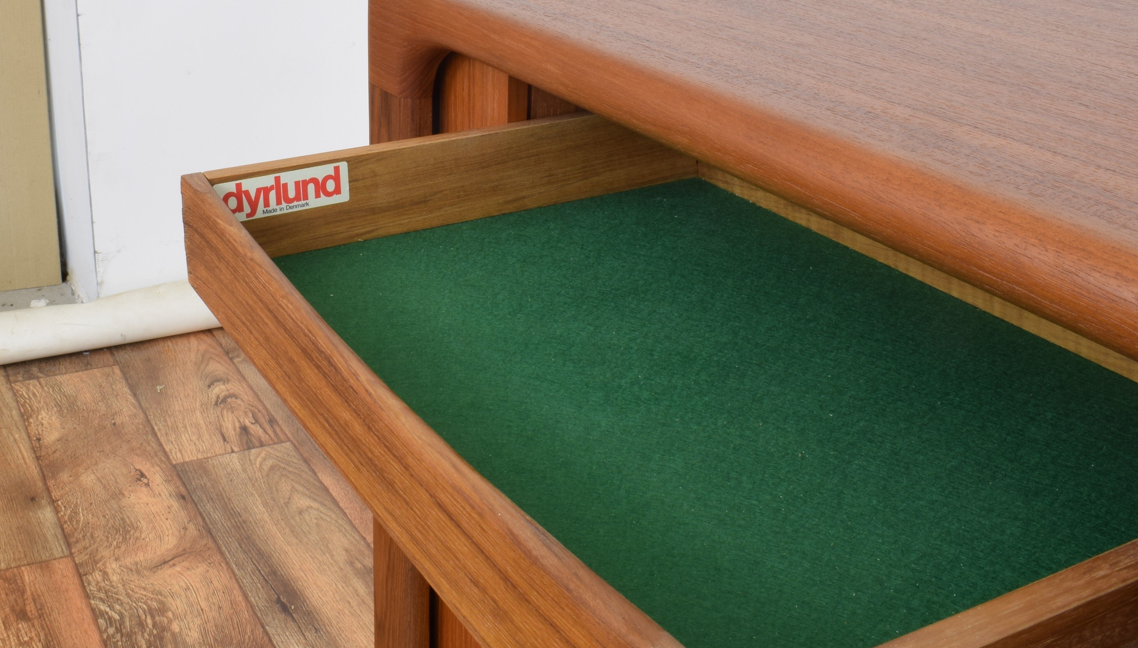 Mid-century danish teak sideboard with tambour doors from dyrlund, 1960s.