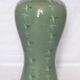Korean vase in crackled celadon with a pattern of ducks and clouds.