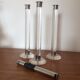 Serie of three candlesticks in Plexiglas and metal 1970