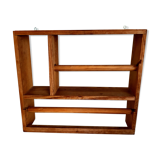 Wooden shelf with unroller wipes everything