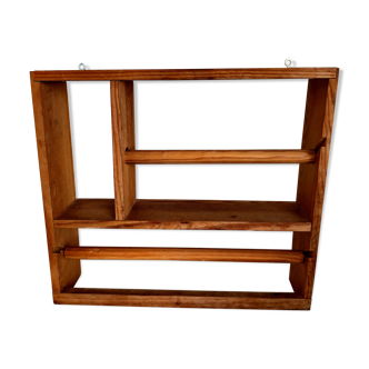 Wooden shelf with unroller wipes everything