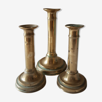 Lot of three old brass candlesticks