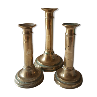 Lot of three old brass candlesticks
