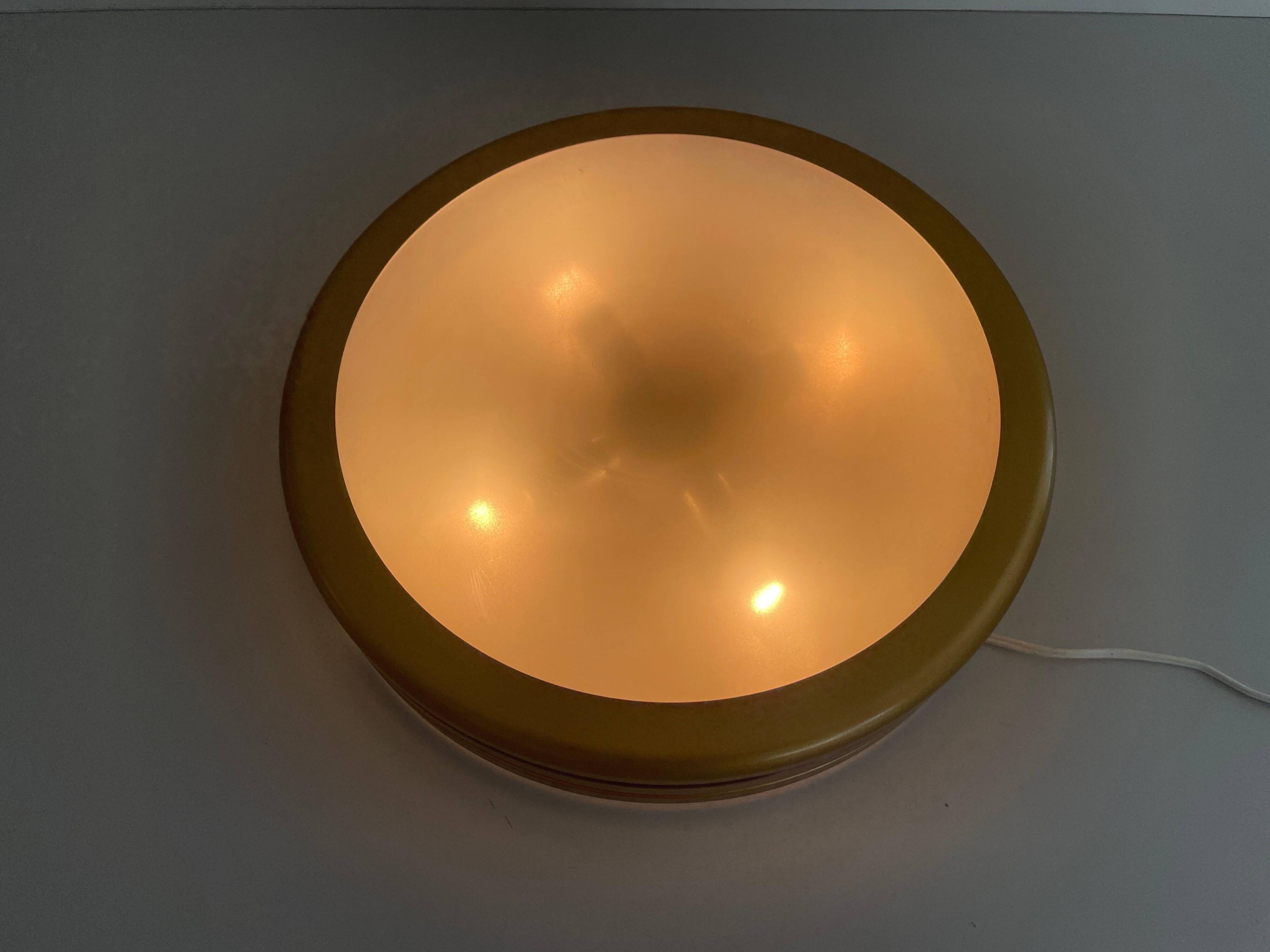 Design/One, flush lamp in glass, gold and brown metal, 1960s, Germany