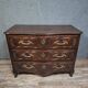 Louis XV/XVIII period Lyonnaise commode in moulded and carved walnut.