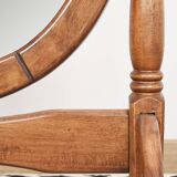Large psychic mirror on legs with pivoting oval frame.