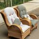 2 rattan and woven wicker armchairs in vintage 70s style