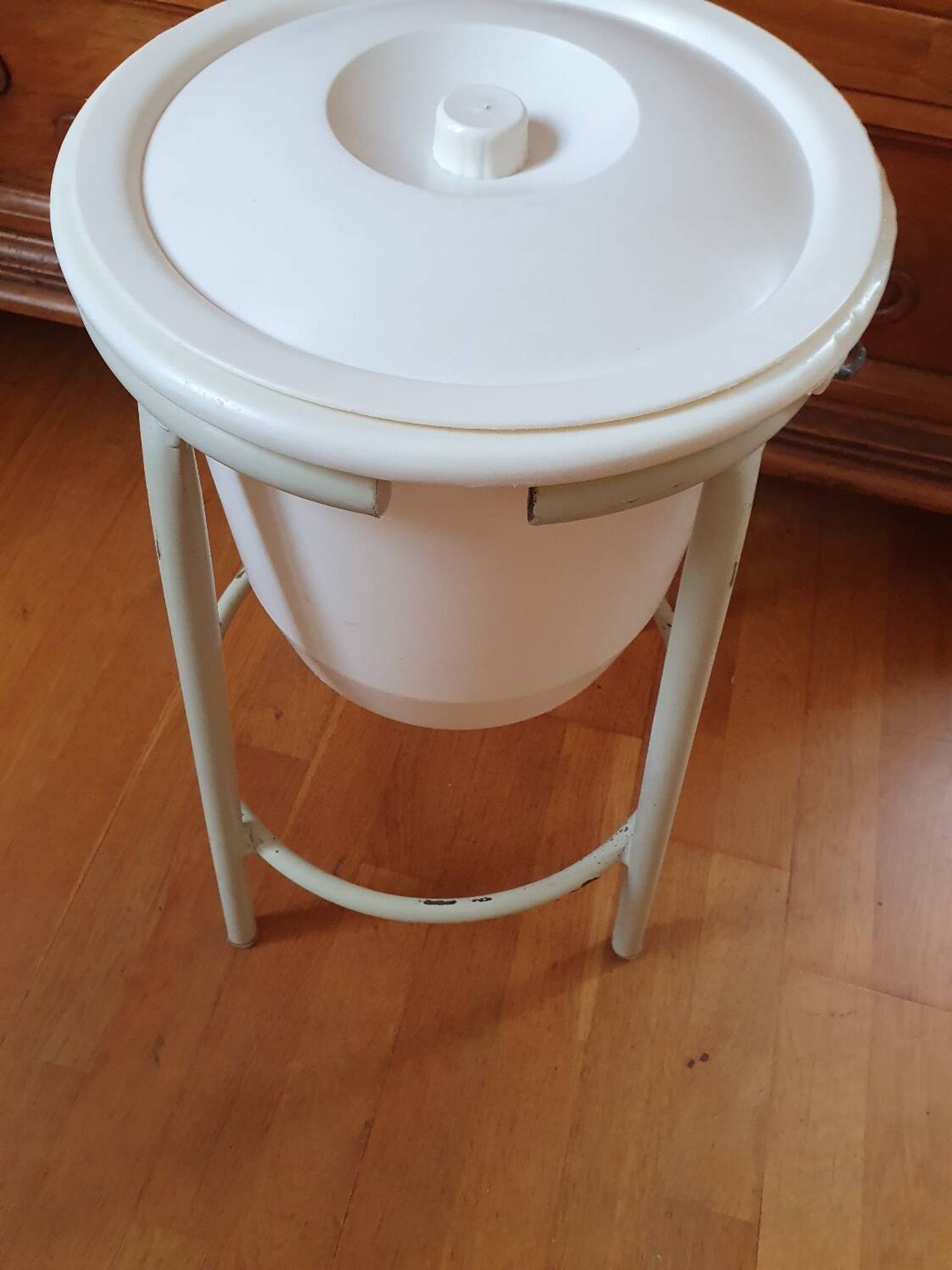 Trash can on vintage industrial style metal base