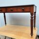 English desk with 2 drawers on green leather