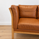 Vintage Danish 2 person sofa in cognac leather with oak frame