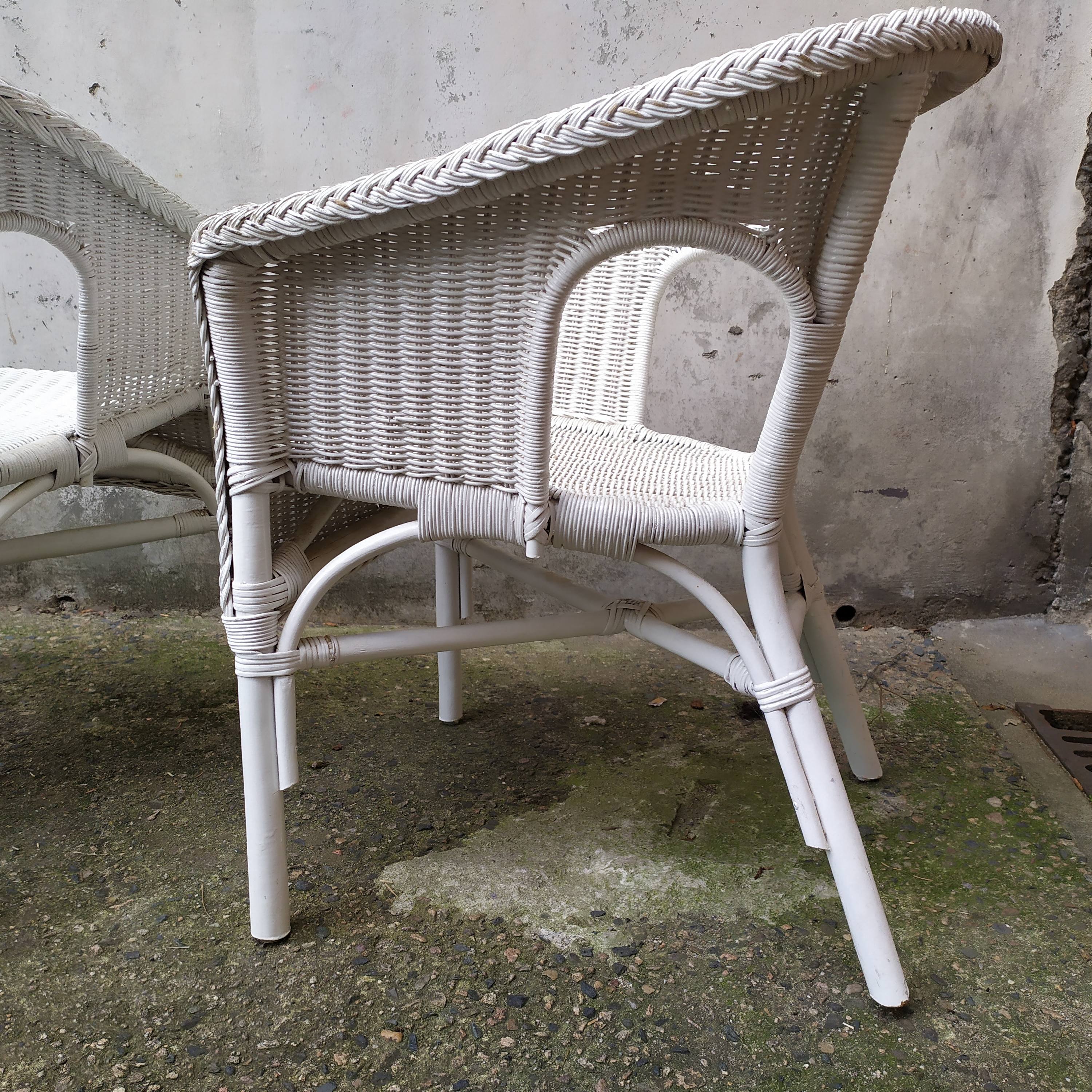 Pair of vintage rattan chairs