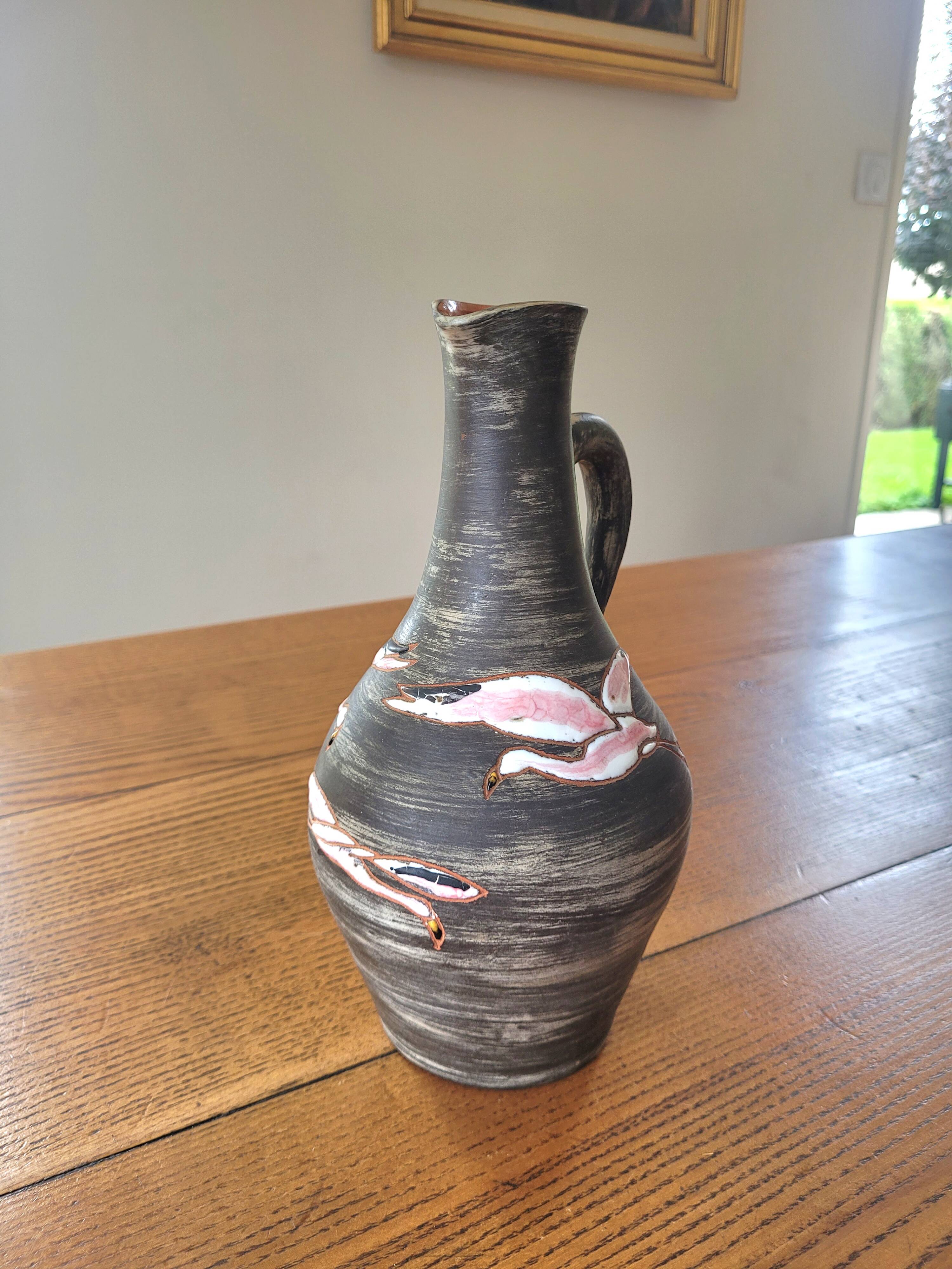 Rare signed ceramic and enameled porcelain pitcher
