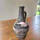 Rare signed ceramic and enameled porcelain pitcher
