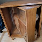 Vintage retractable swivel bar cabinet from the 1950s