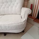 Vintage white curved tufted three-seater canapé