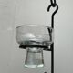 Mid-century metal and glass pendant light from the 1960s.