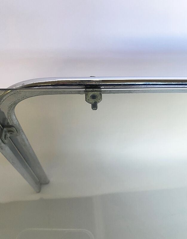 Metal table and smoked glass