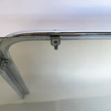 Metal table and smoked glass