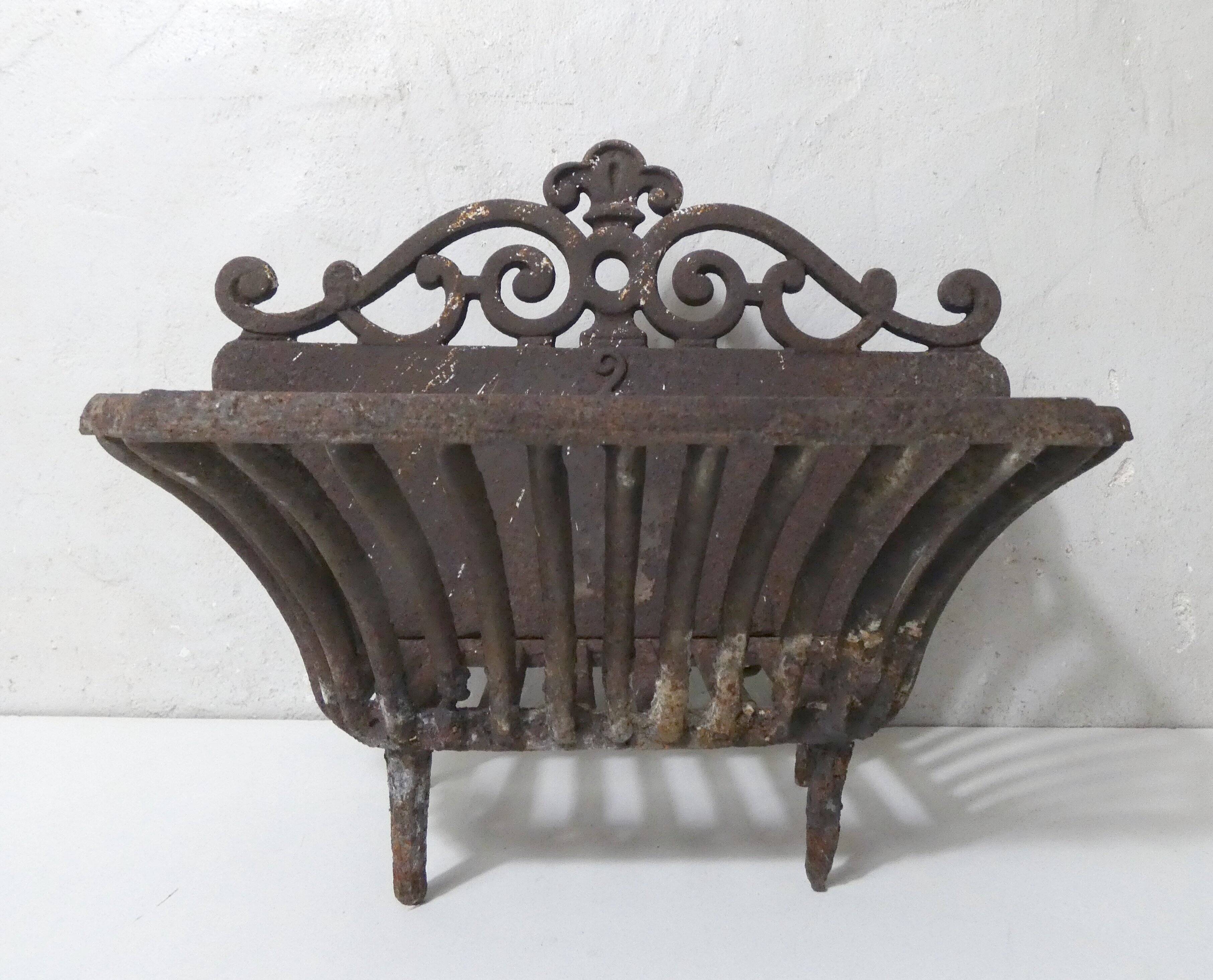 vintage cast iron log holder