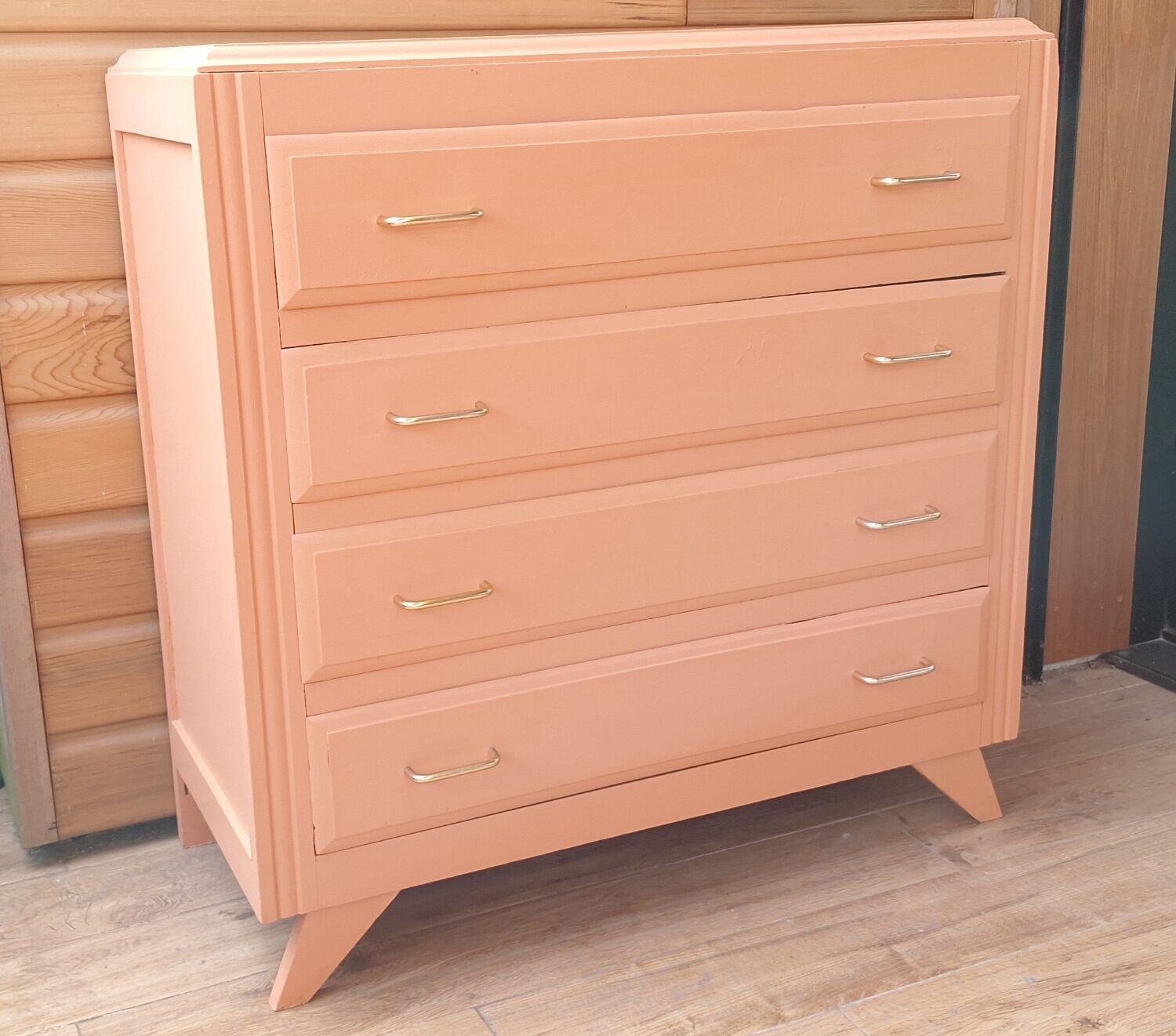 Pretty vintage salmon chest of drawers.