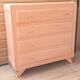 Pretty vintage salmon chest of drawers.