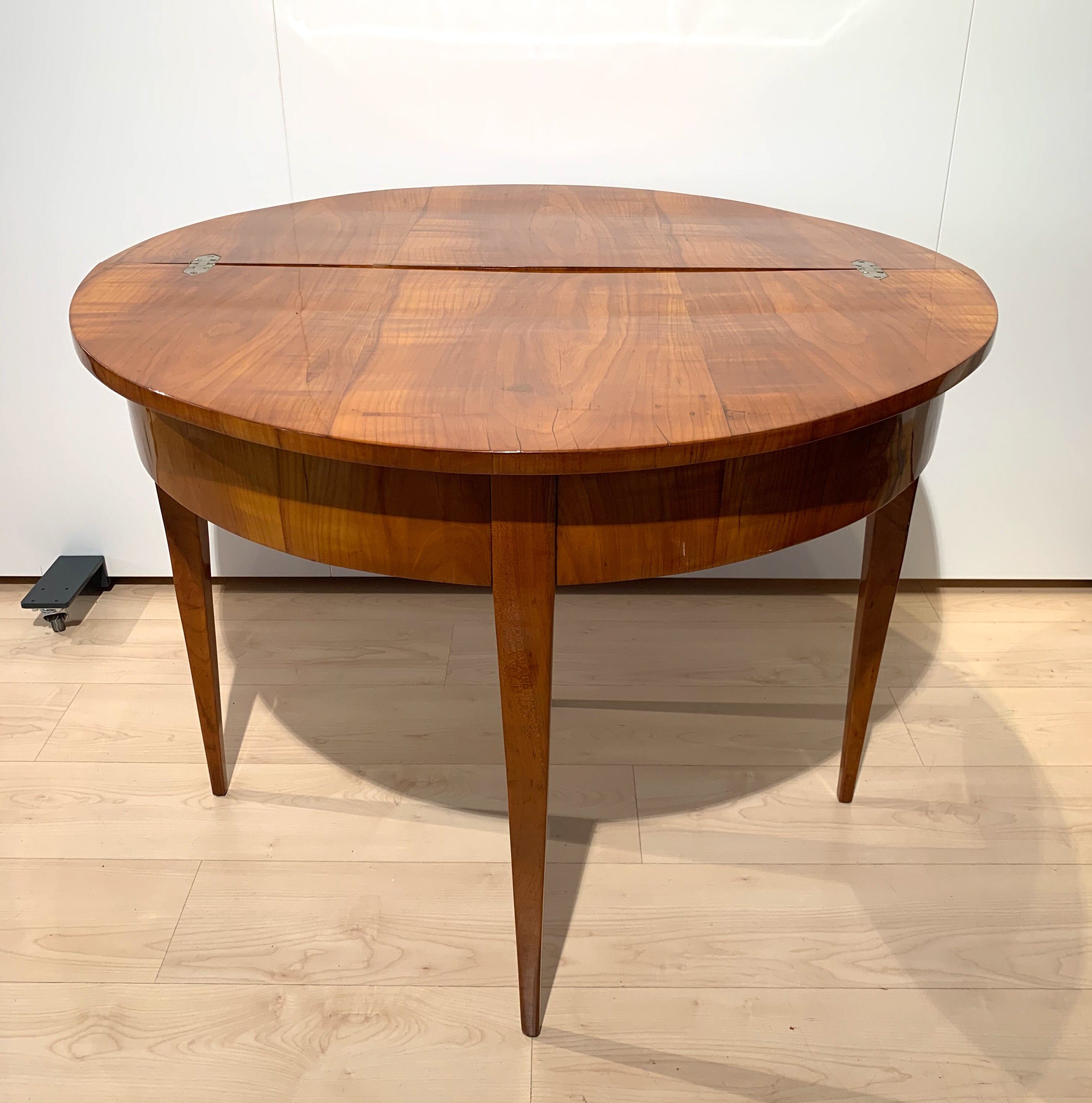 Biedermeier demi-lune fold-out table, cherry veneer, south germany, circa 1820