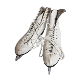 Pair of vintage leather ice skates, white, chrome steel blades