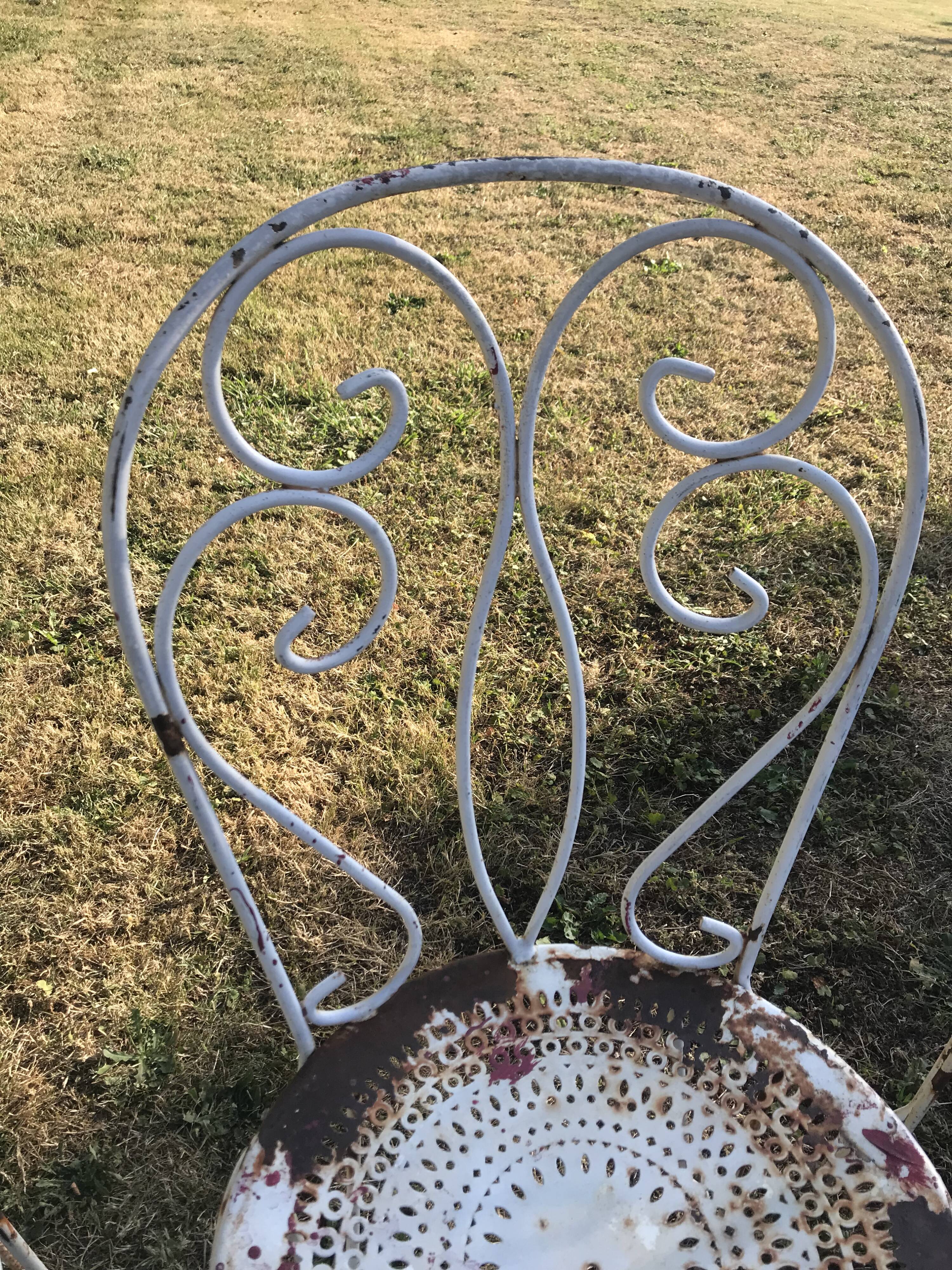 4 wrought iron garden chairs