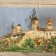 Watercolor landscape with vintage mills