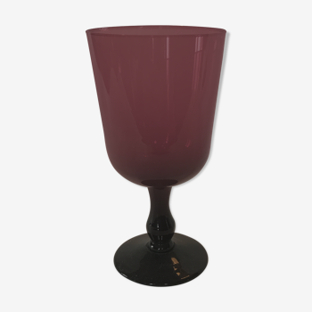 Purple glass vase on foot
