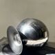 Space age ashtray in chrome metal, 1970s design.