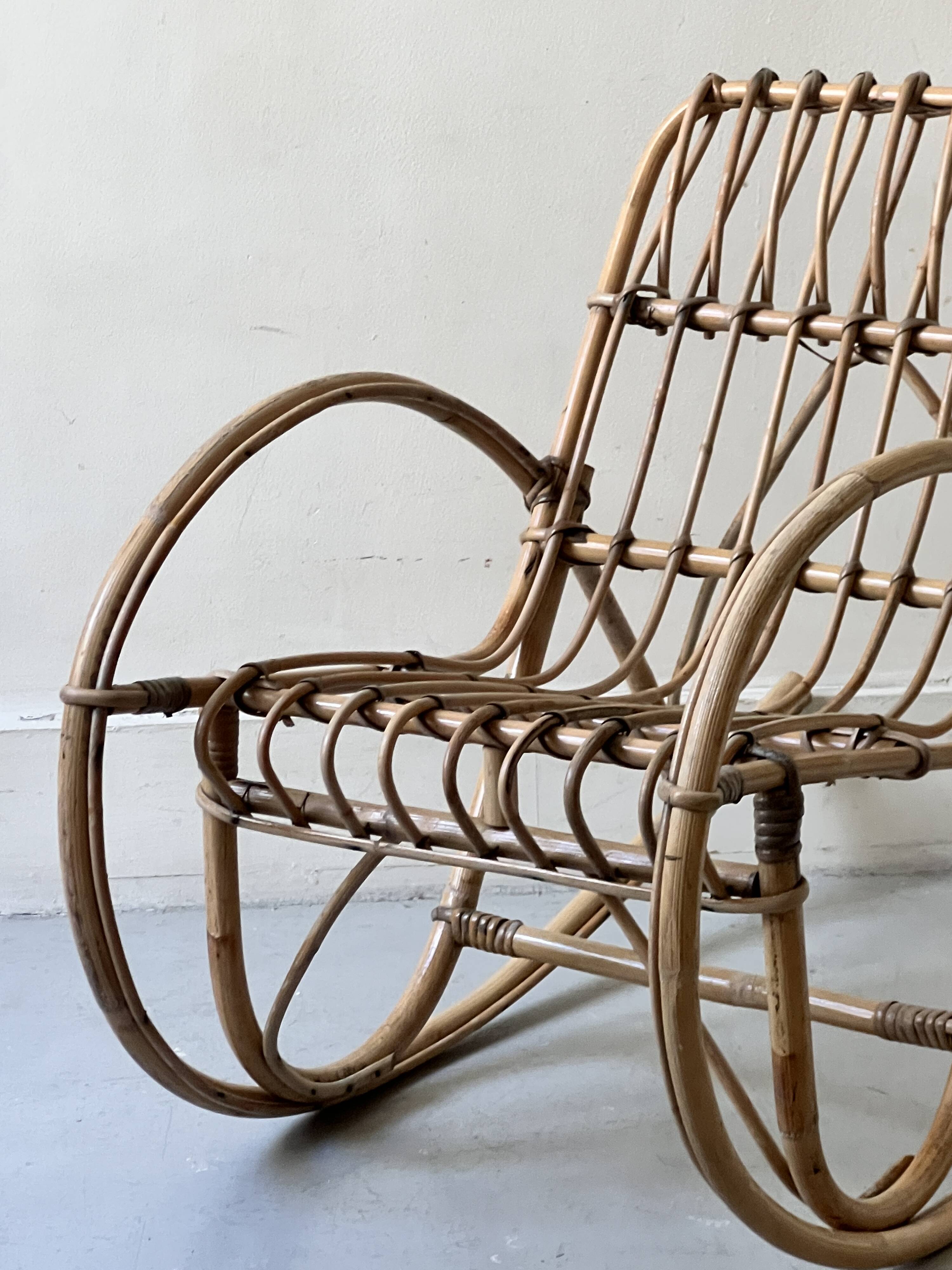 Child's rocking chair in rattan/bamboo, France 1950.