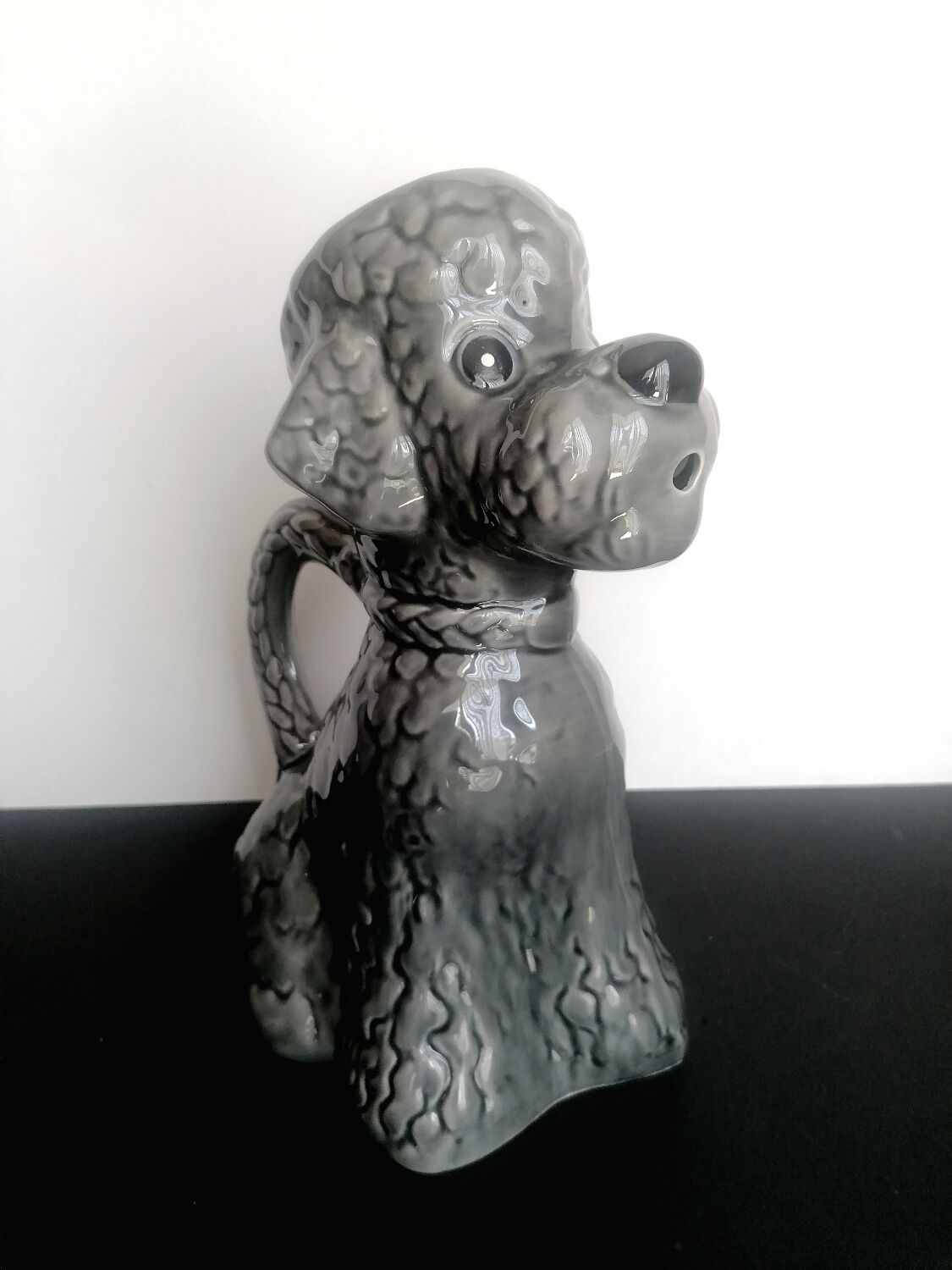 Zoomorphic pitcher slurry poodle