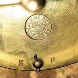 Clock, cartel in gilded bronze. Louis XV
