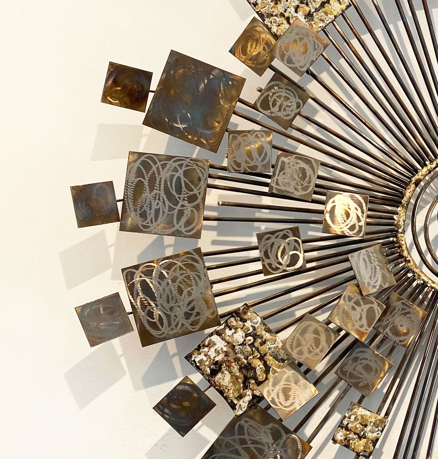 Brutalist Sunburst wall sculpture by Curtis Jere. USA, 2000s