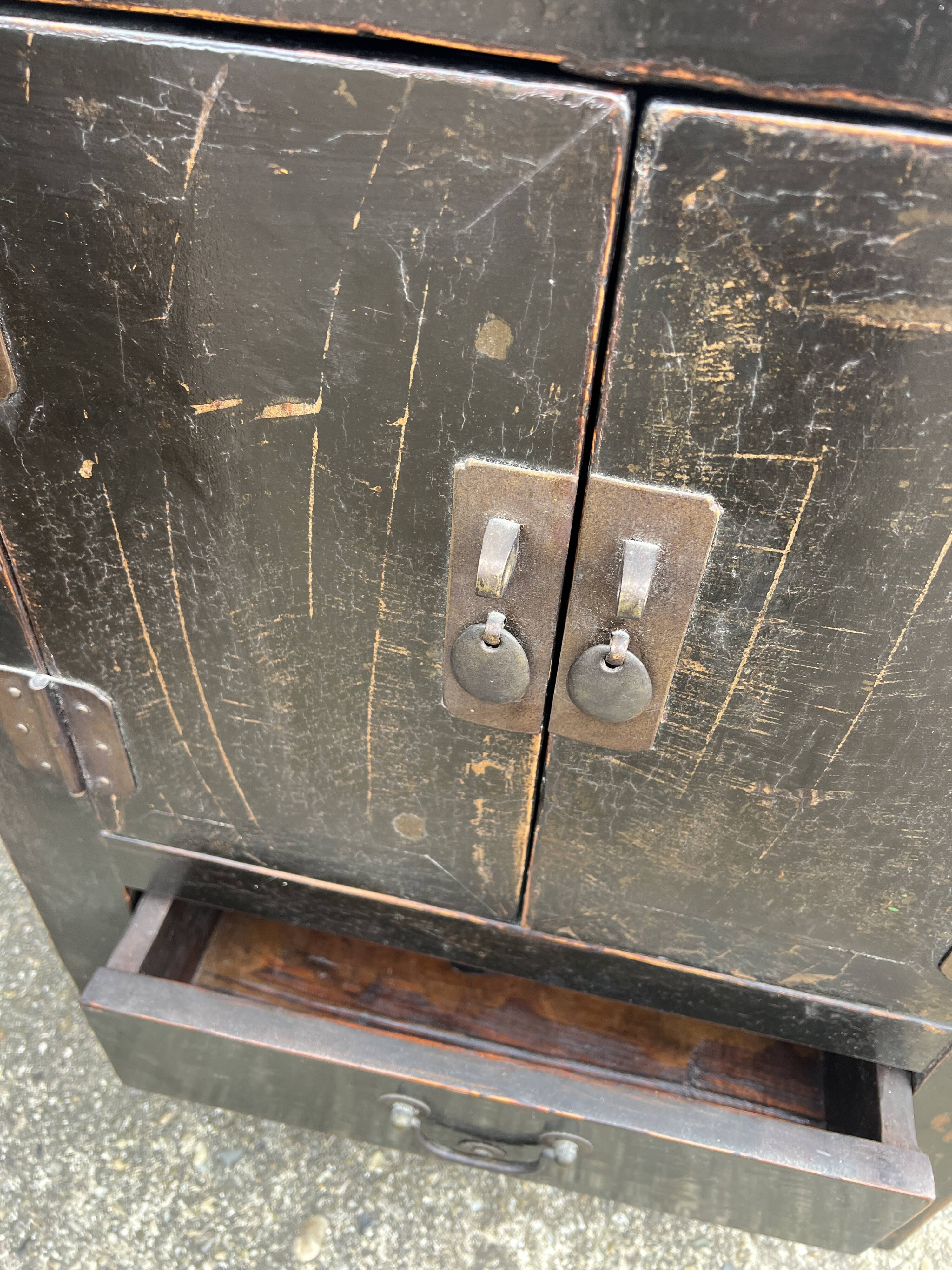 Pair of small occasional or sofa end pieces, lacquered in Asian black