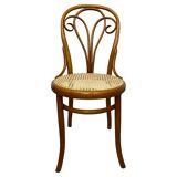 Curved wooden dining chair by Löbl Wieisskirchen