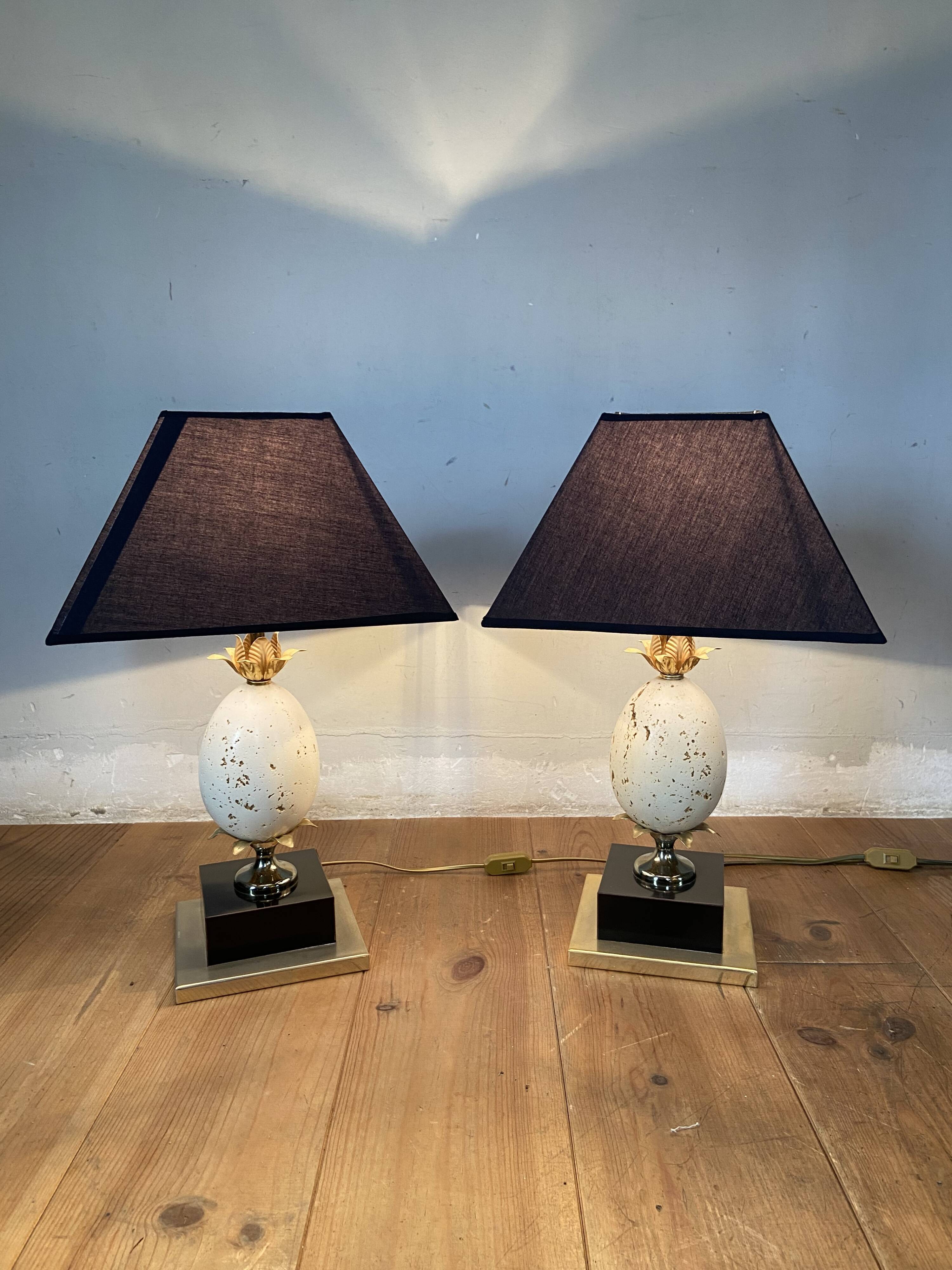 Pair of designer ostrich egg lamps in travertine from maison barbier
