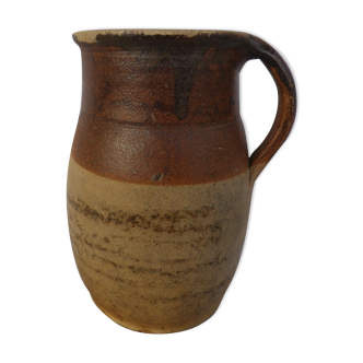 Old stoneware milk jug