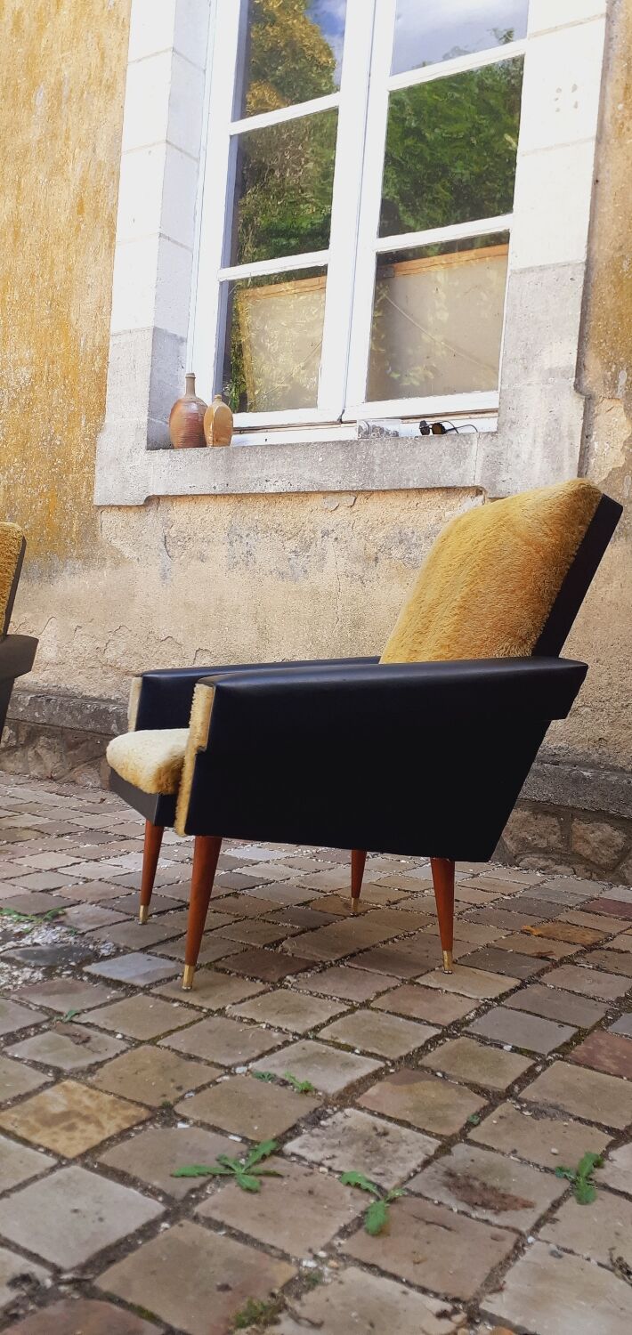 Pair of vintage 60s armchairs in black imitation leather and mustard toffee